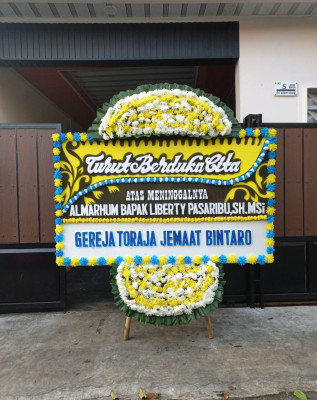 Papan Bunga Duka di Pangatikan